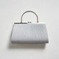 PLEATS LAME HAND BAG