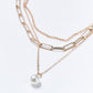 GOLD STRAND NECKLACE
